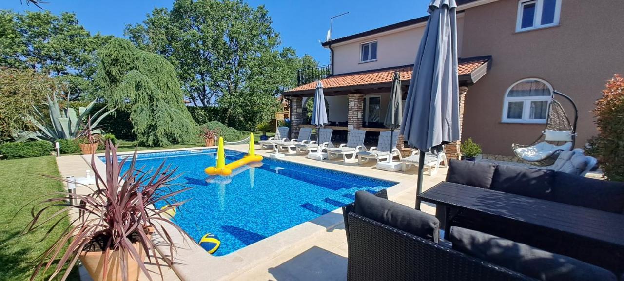 Villa AGAVA Umago Esterno foto